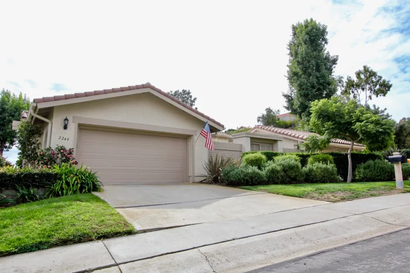 Brown home with American flag inside el Dorado II in La Jolla California