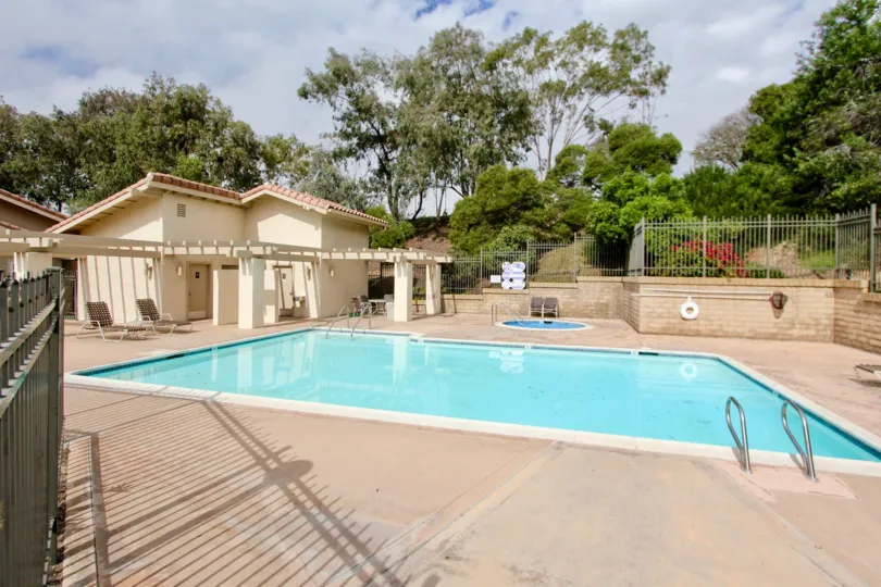 The El Dorado with a large pool and many trees around