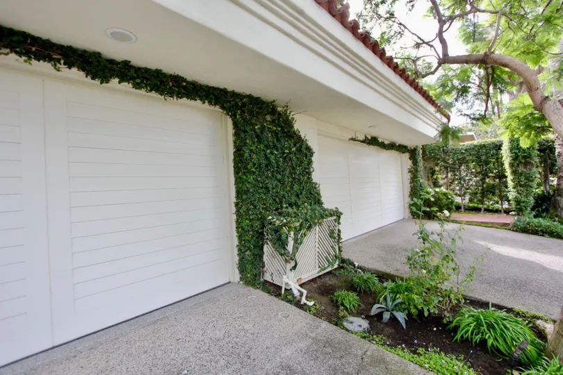Ivy covered garage doors inside El Paseo Grande in La Jolla CA