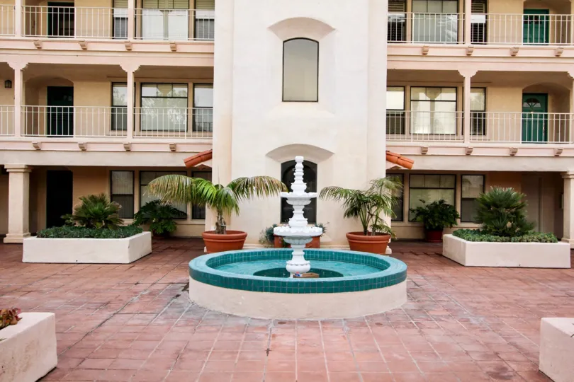 Three story housing & fountain inside La Flor De La Jolla in La Jolla CA