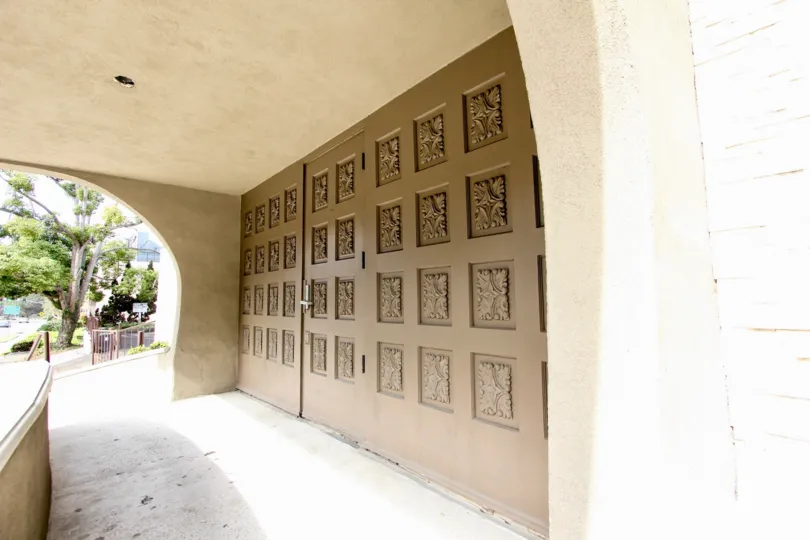 A wide door in the La Jolla Estates villa on the sunny day