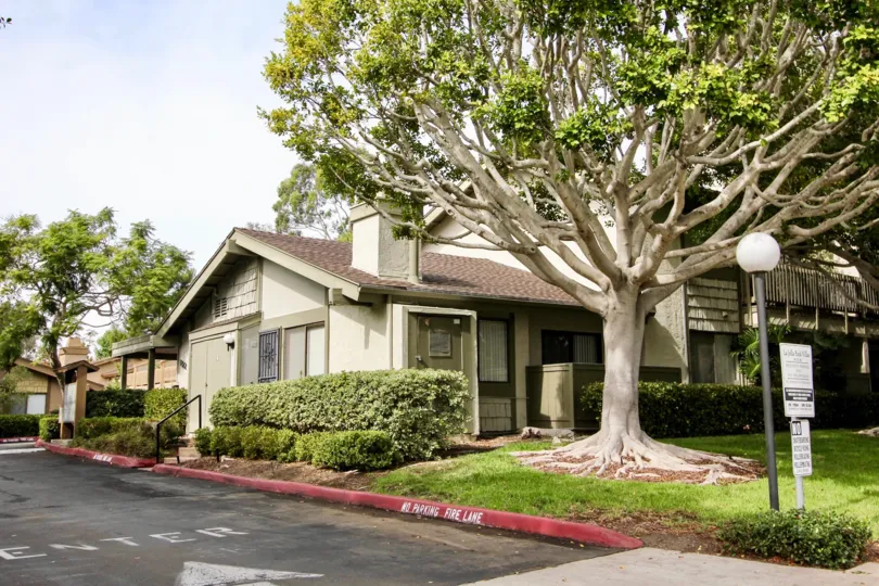 Housing with trees and grass inside of La Jolla Park Villas in La Jolla CA