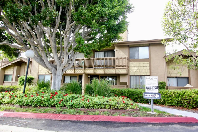 Red curb in front of housing units inside La Jolla Park Villas in La Jolla CA