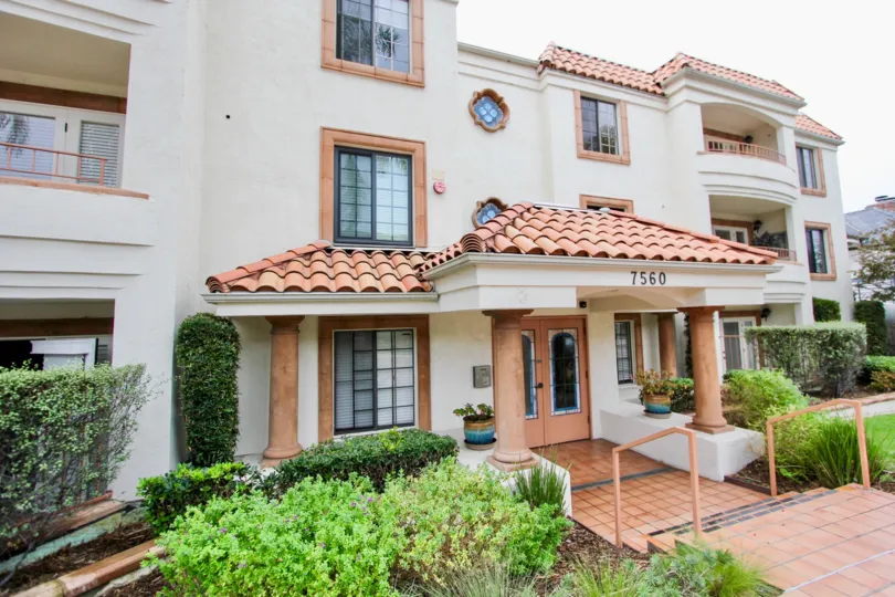 Three story pink & white units inside La Jolla Park in La Jolla California