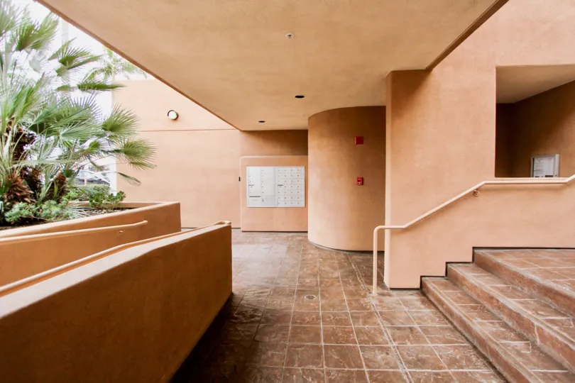 The Balcony in the La Jolla Promenade with trees and door steps