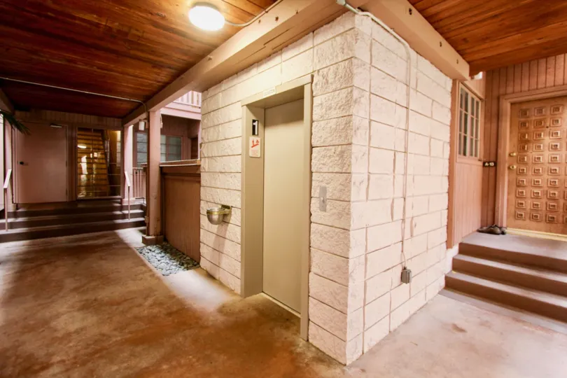 Inside area with elevator and doorways in La Jolla Racquet Club in La Jolla California