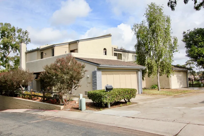 A SUNNY DAY IN THE LA JOLLA SHORES HEIGHTS WITH HOUSE AND SOME OTHER TREES AND MAIL BOX