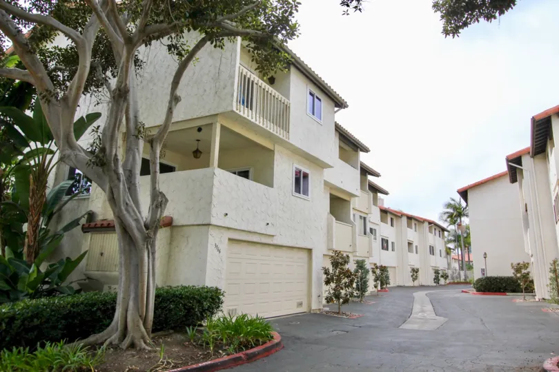 Three story town homes inside La Jolla Village Tennis Club