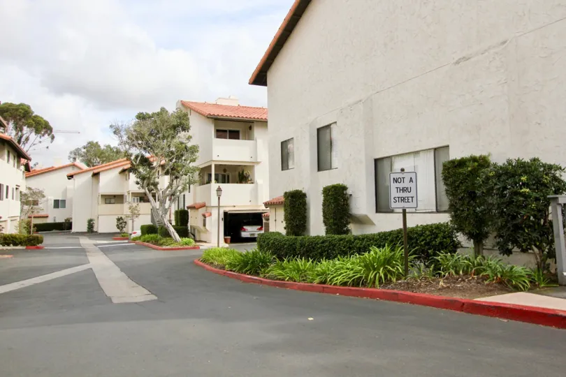 Cloudy sky hangs over street of the La Jolla Village Tennis Club in California