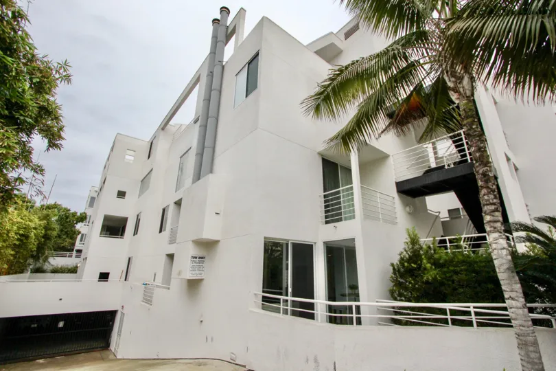 White condo units with underground parking garage in Lighthaus at La Jolla CA