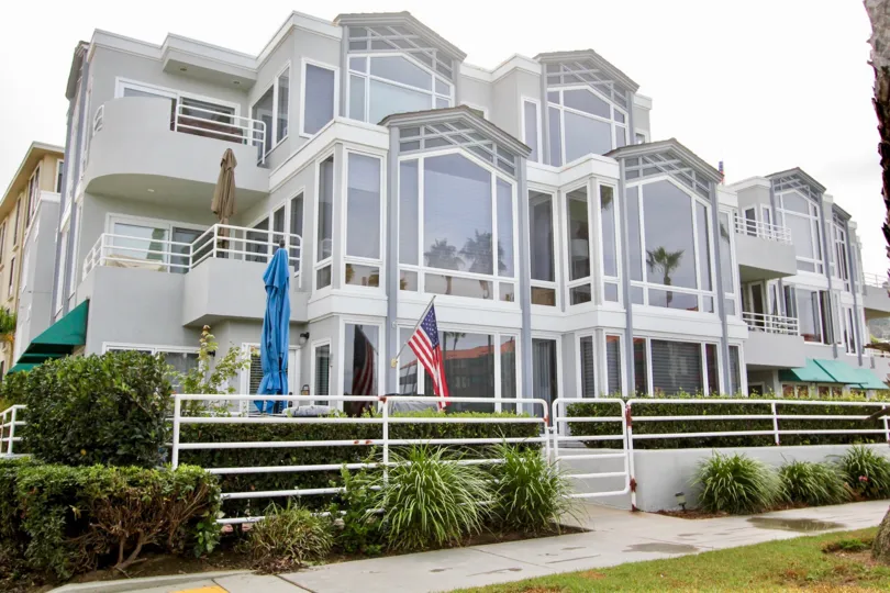 LJ Windigo Three-Story Gray Building with Large Windows La Jolla California