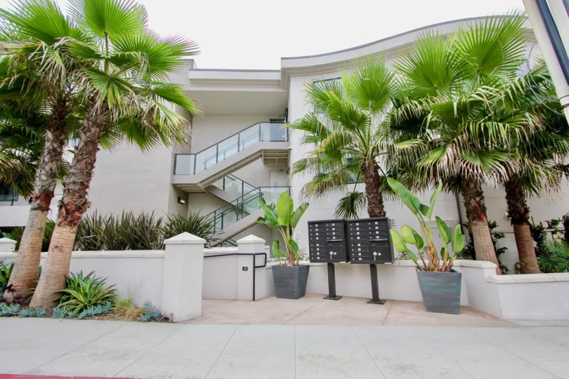 Stairway with glass railing in One Neptune at La Jolla CA
