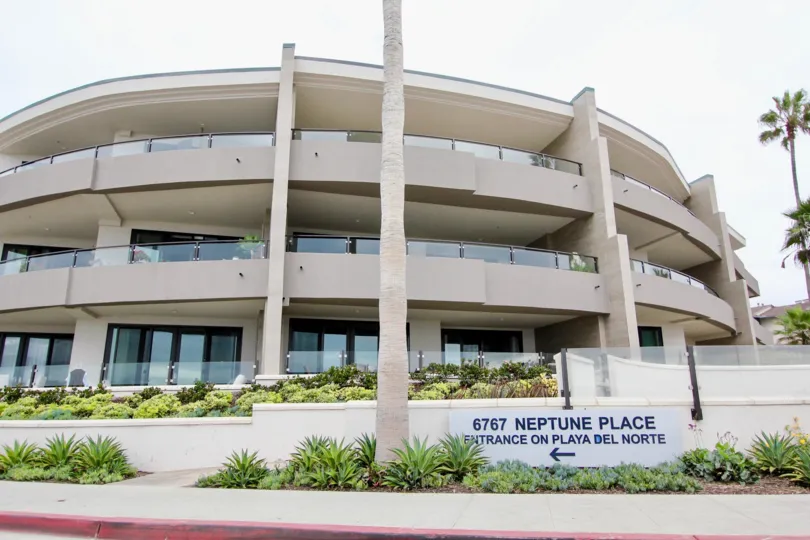 Round four story building at One Neptune in La Jolla CA