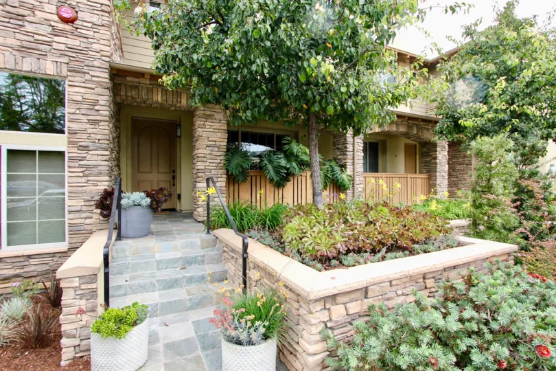 Plans and stone planters inside Paseo La Jolla in La Jolla CA
