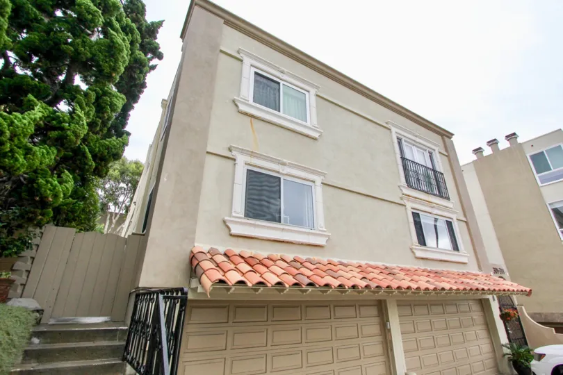 Two brown garage doors inside Prospect Manor in La Jolla CA
