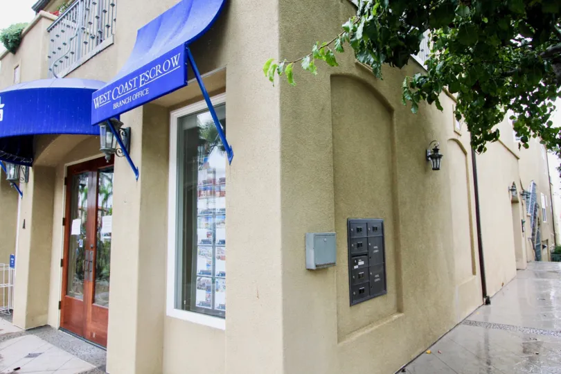 The shop in the prospect village is West Coast EsCrow has near street with lamp and postal box