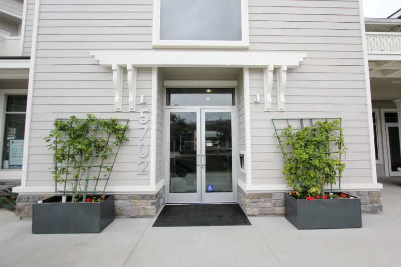 Gray entrance into a residential building inside Rosemont Condos in La Jolla CA