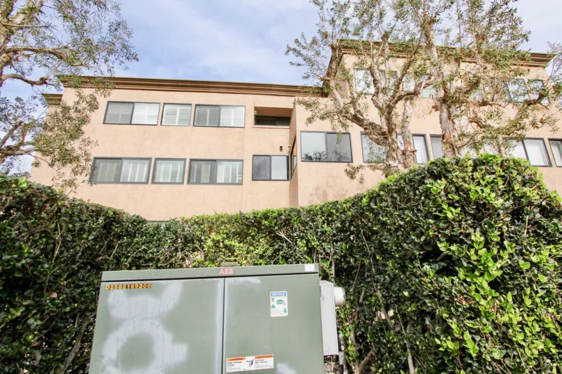 Electrical box down below a pink condo high rise inside Sandpiper in La Jolla CA