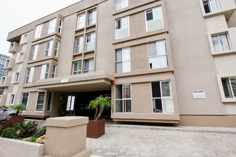 Four story housing with little palms at it's base in Shorepoint in La Jolla CA
