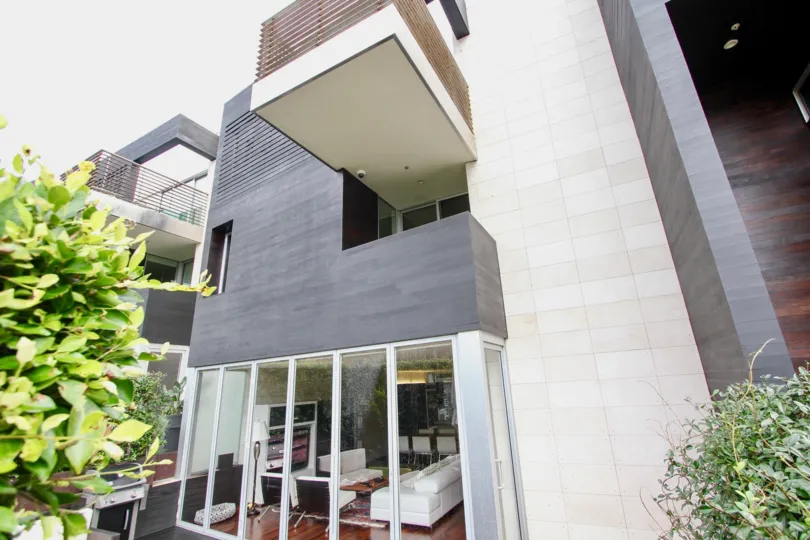Glassed hall view with furniture and balcony of Six by Sebastian Mariscal.