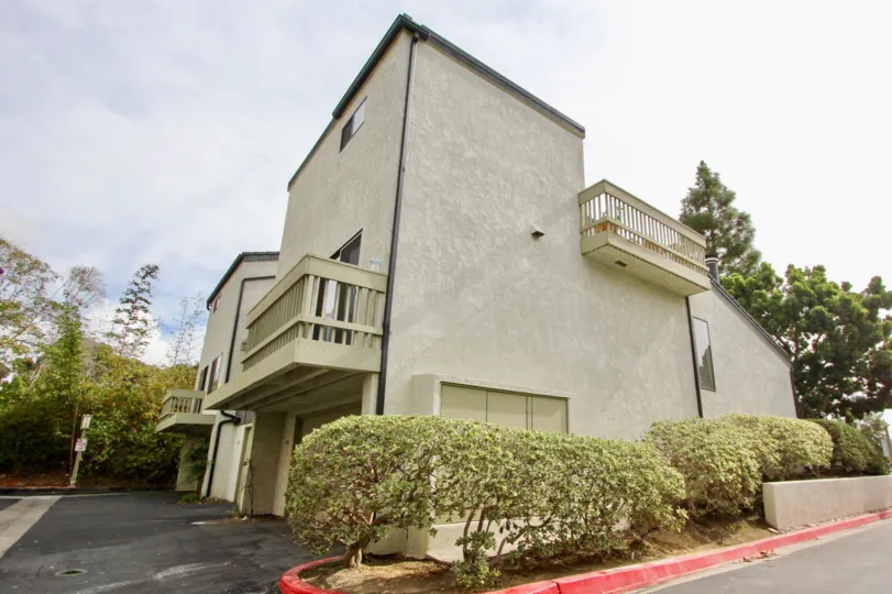Tall condo building inside woodlands in La Jolla California
