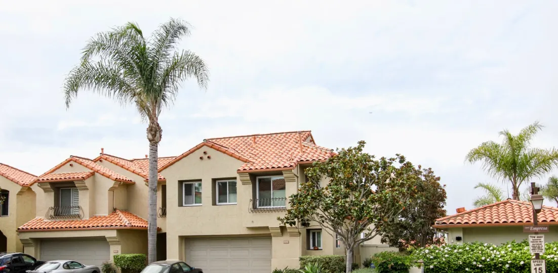 A two story Ventana home with a gray garage in La Jolla CA