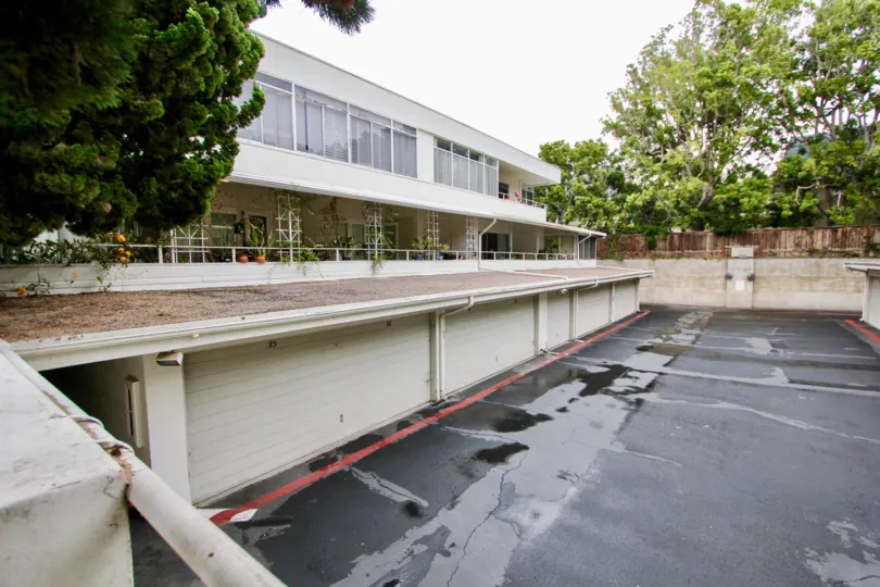 Black parking with wet spaces in Villa Del Lido in La Jolla CA