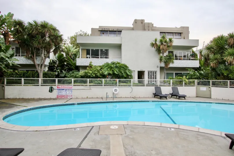 Inviting tropical setting with pool just waiting for you to jump in!