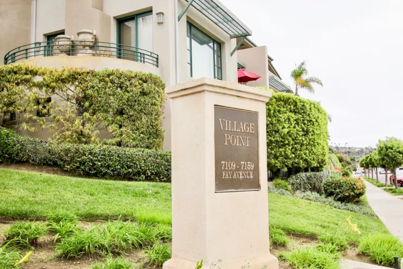 Walking path with lawns and spacious villas of Village Point.