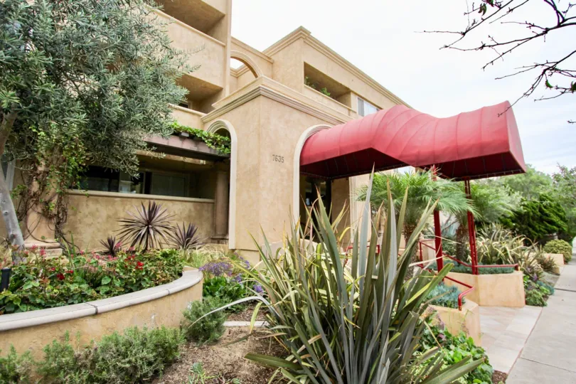 Red awning over entrance to the Villaggio community at La Jolla CA