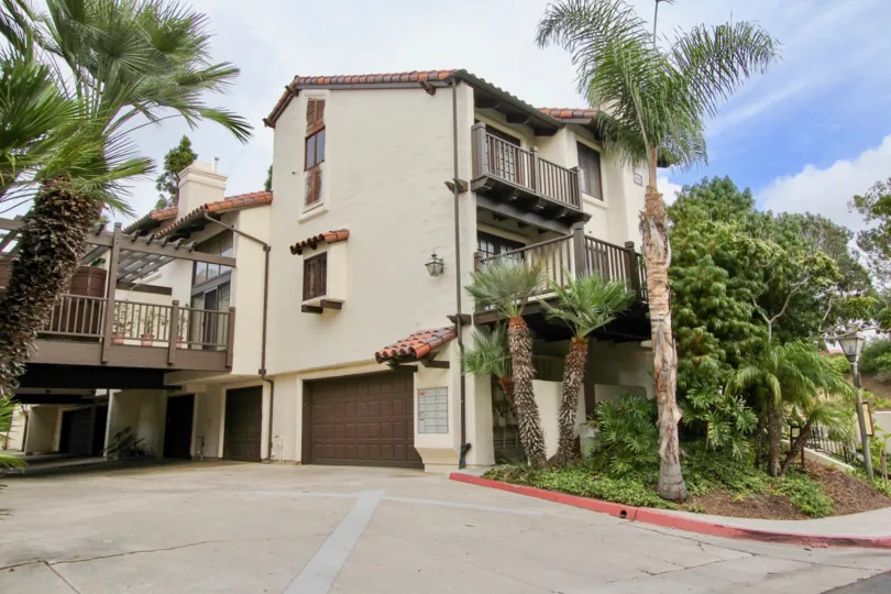 Residential units with garage at base inside Villas Mallorca in La Jolla CA