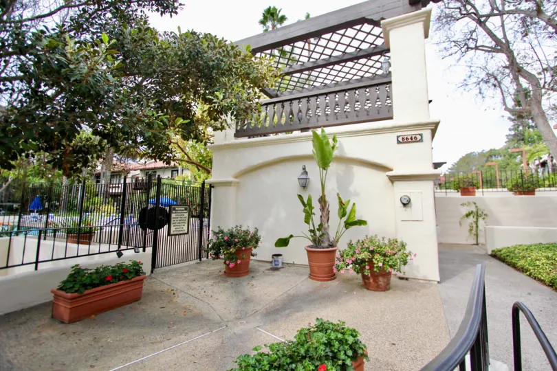 Residential tower with plants at it's base in Villas Mallorca in La Jolla CA