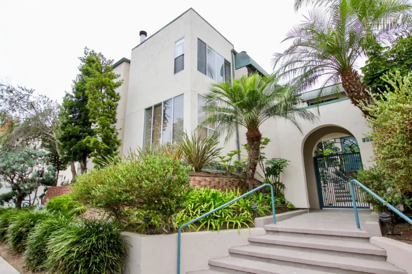 Fancy arched entrance with black gate in Wind N Sea in La Jolla CA