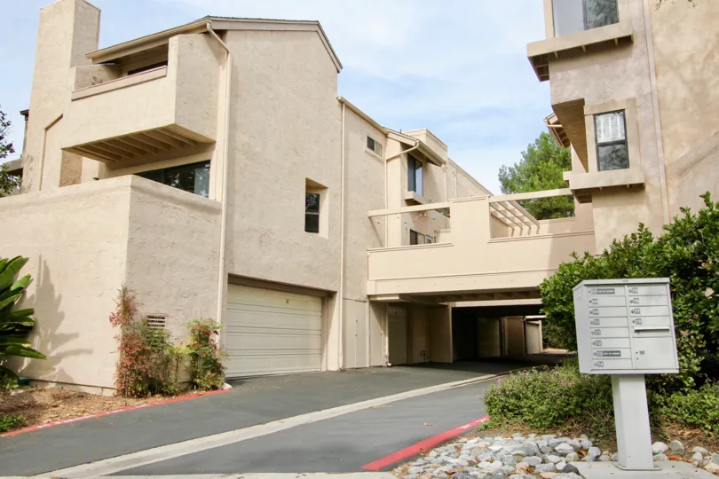 Gray driveway between units in Woodlands South at La Jolla California