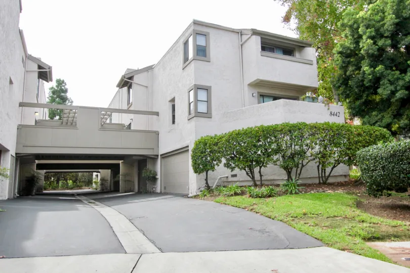 Lone driveway with drain channel inside Woodlands West II in La Jolla CA