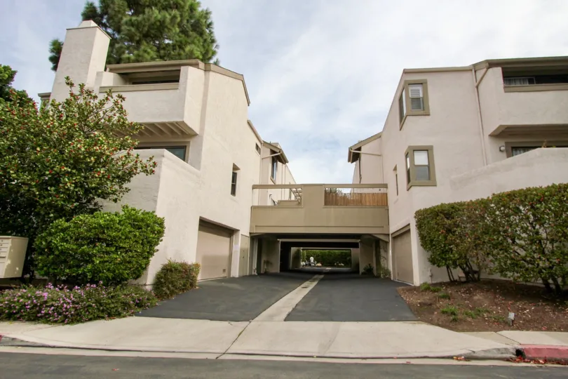THE BUNGALOW IN THE WOODLANDS WEST II WITH THE PLANTS, TREES, ELECTRIC BOX