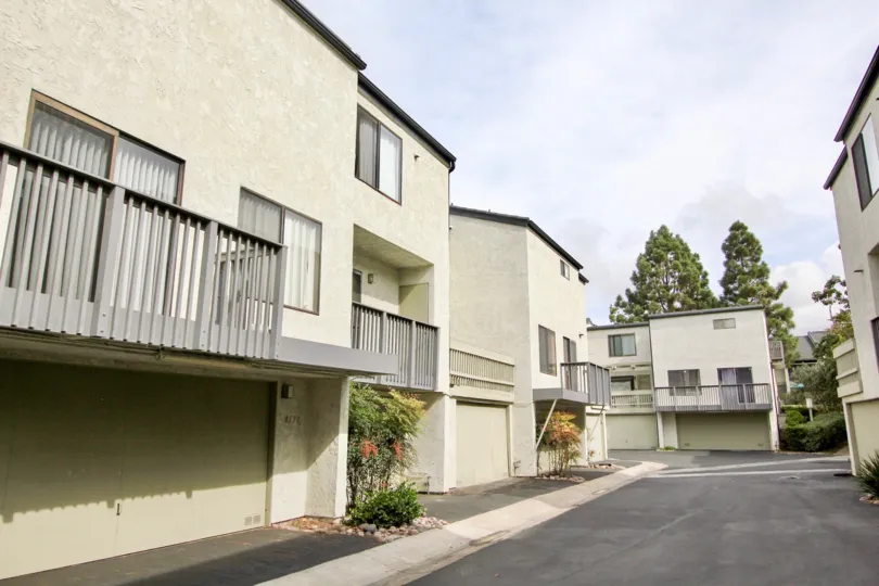 Row of buildings near driveway at the Woodlands in La Jolla CA