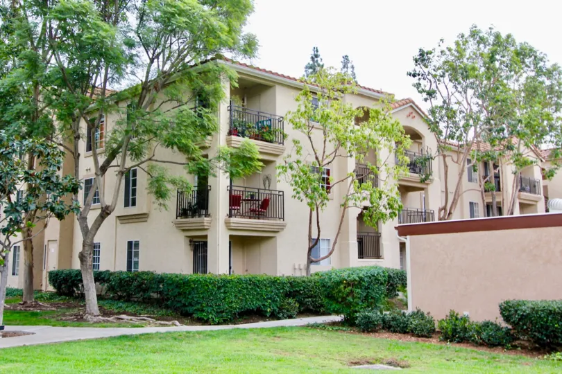 Awesome view of lawn in front of a villa with trees in Central Park La Mesa of La Mesa