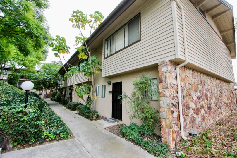two story townhmoe in a great Community with a pool and garage