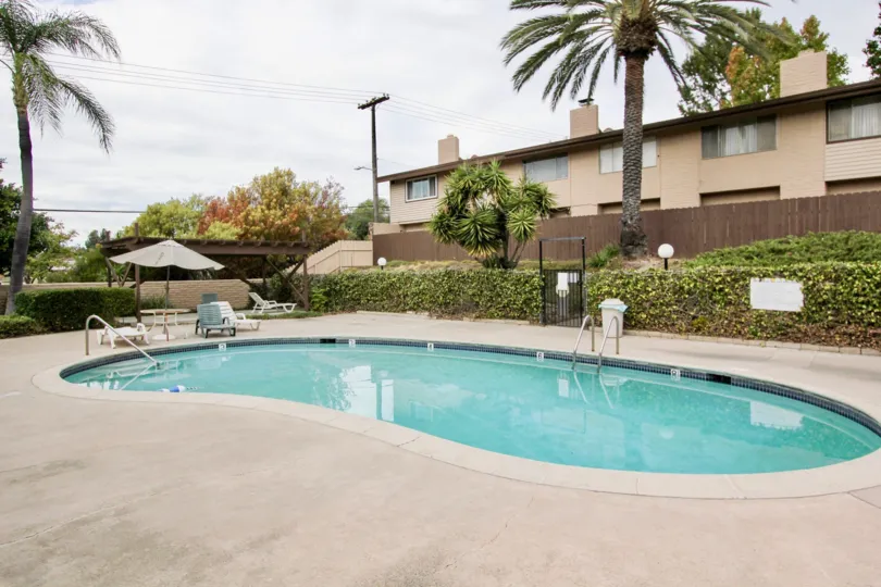 A sunny day in Grossmont Village house with beautiful garden and swimming pool