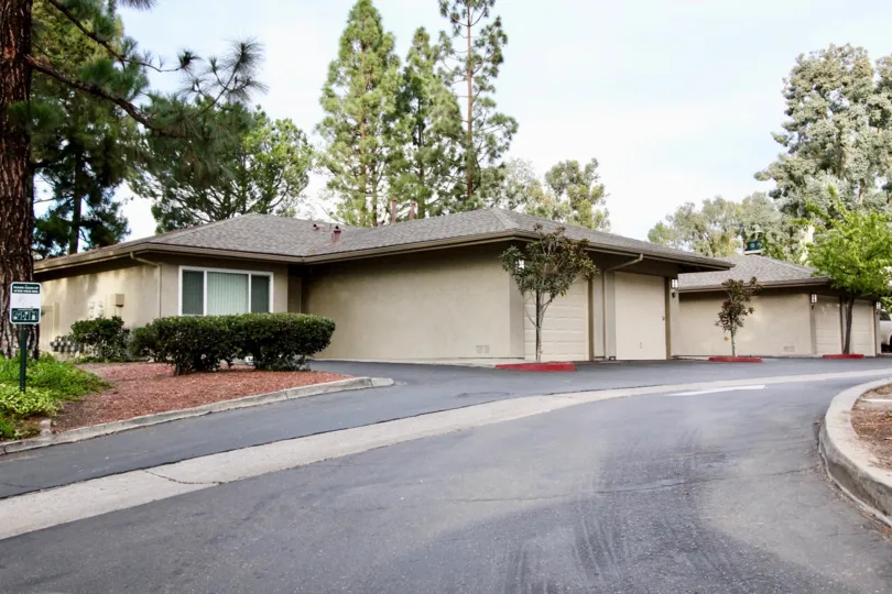 Beautiful approach with trees around villas in La Mesa Racquet & Swim Club