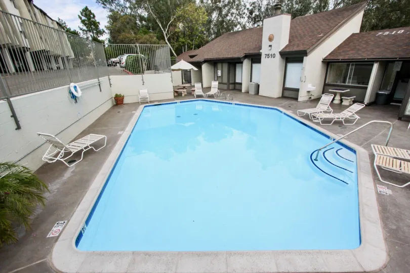 In Apartment 7510 has swimming pools with chairs of Parkway Pointe