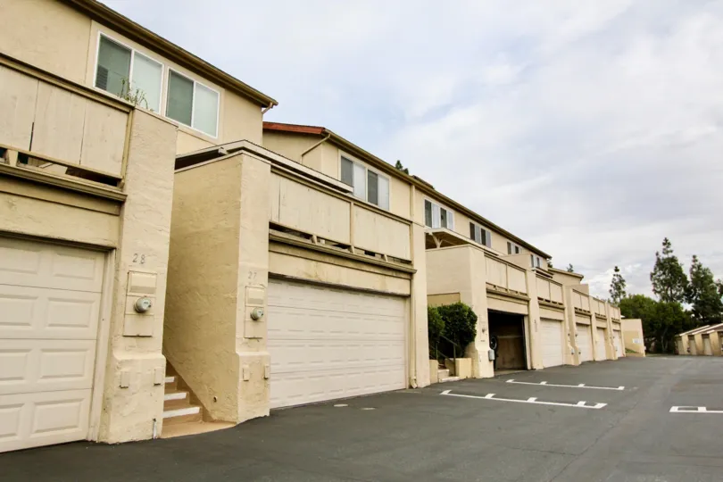 THE 28 APARTMENT IN THE PARKWAY VILLAS WITH THE SHUTTERS, PLANTS, TREES