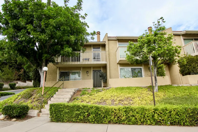 Excellent green trees in front of a villa in Parkway Villas of La Mesa
