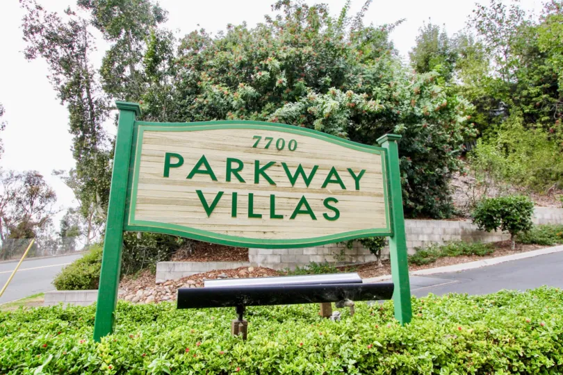 THE 7700 PARKWAY VILLAS IN THE PARKWAY VILLAS WITH THE PLANTS, TREES, THAR ROAD