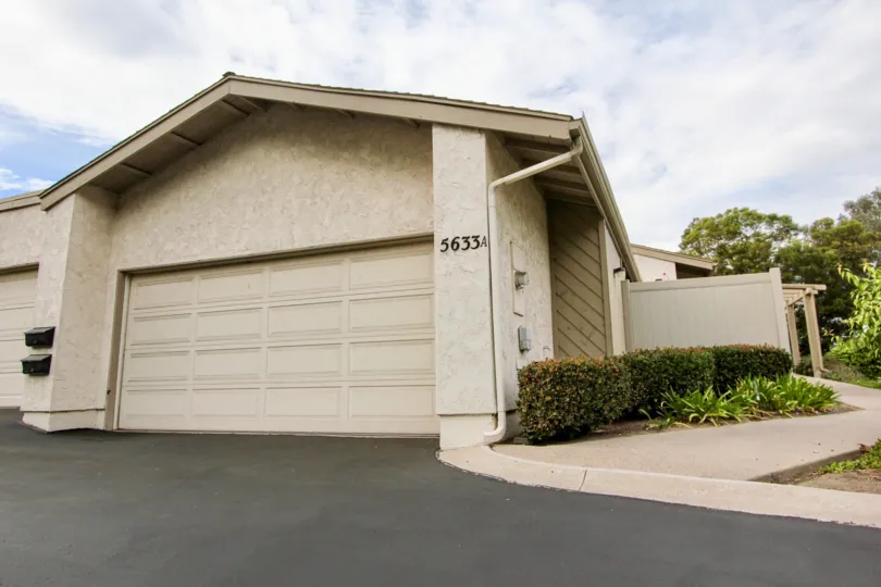 Smoke Tree Home side view with road available at La Mesa in California