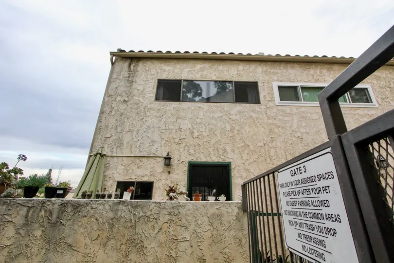 Side gate view of Villa De Fanta community, Le Mesa, CA