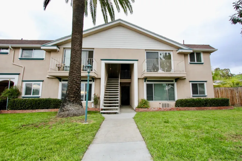 a pleasant day in the westwood village with a big house that has step on its entrance
