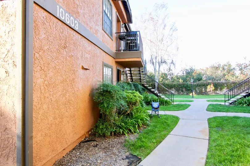 THE 10603 APARTMENT IN THE ARBOR RIDGE WITH THE UPSTAIRS, CHAIRS, GROUND, LAWN