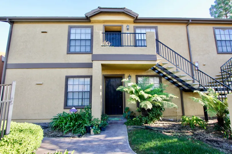 A sunny day in the area of Arbor Ridge, outside, stairs, condo, balcony, door, grass, sidewalk